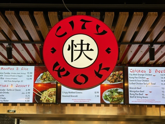 A restaurant menu with asian writing on it